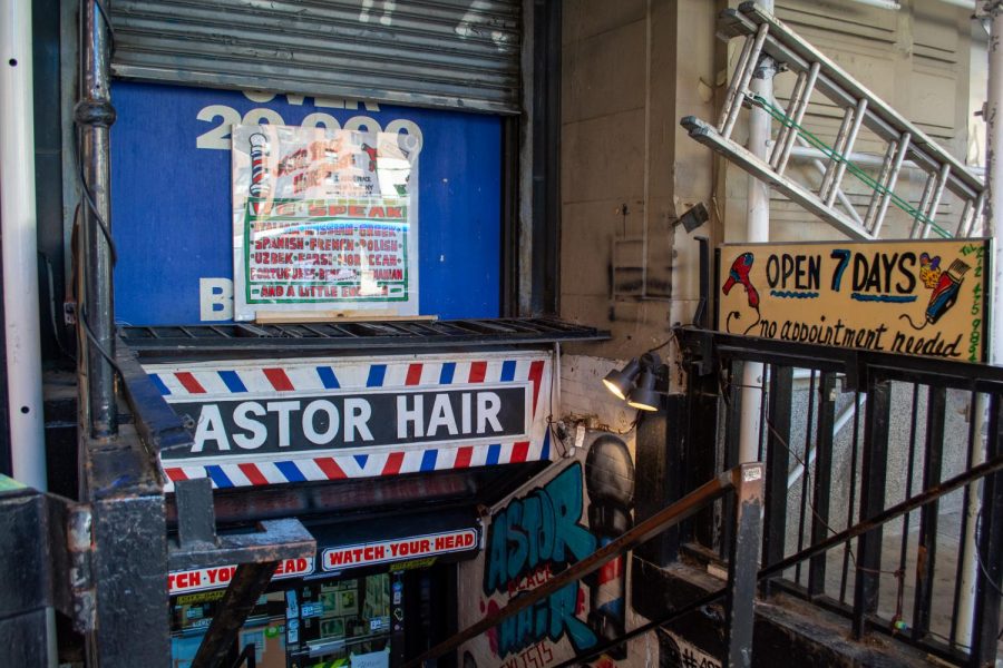 Astor Place Hairstylists is located at 2 Astor Pl. The shop has been bustling with barbers and customers of all ages for decades. (Staff Photo by Manasa Gudavalli)
