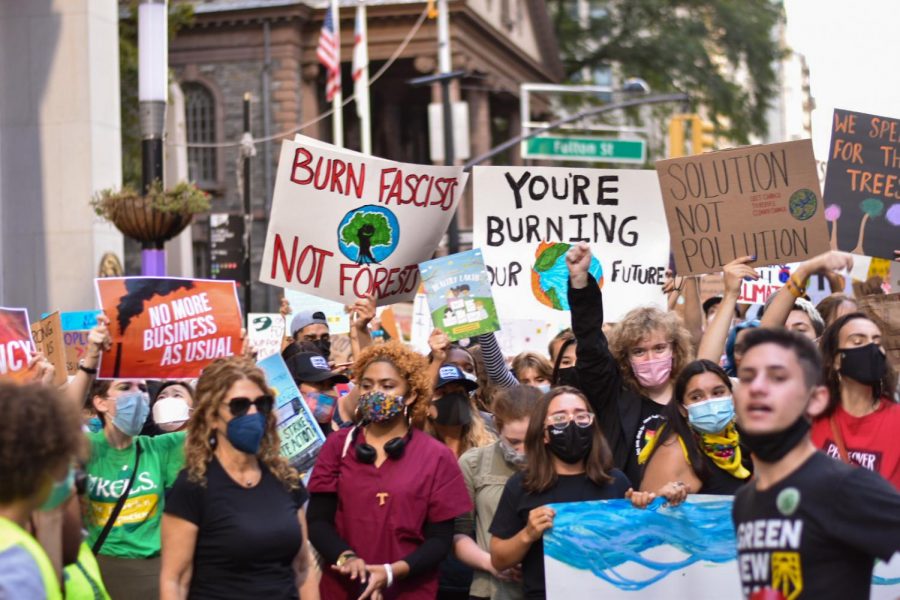 Large crowds of activists take to the streets of Downtown Manhattan. 