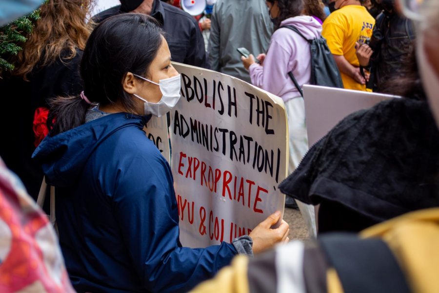 NYU students protested when former Colombian president Álvaro Uribe Vélez was invited to speak at an NYU event about sustainability and climate politics. NYU is not doing a sufficient job of acknowledging the contributions that the Latine community has made to the university. (Staff Photo by Manasa Gudavalli)