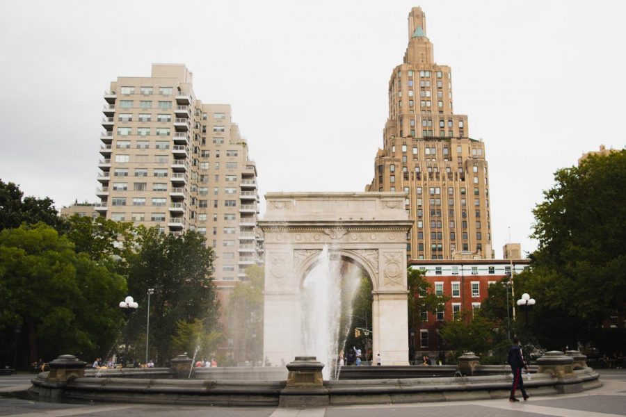 While NYU doesn’t have a traditional quad, the park at the center of Greenwich Village offers many spots to cry between classes. (Staff Photo by Jake Capriotti)