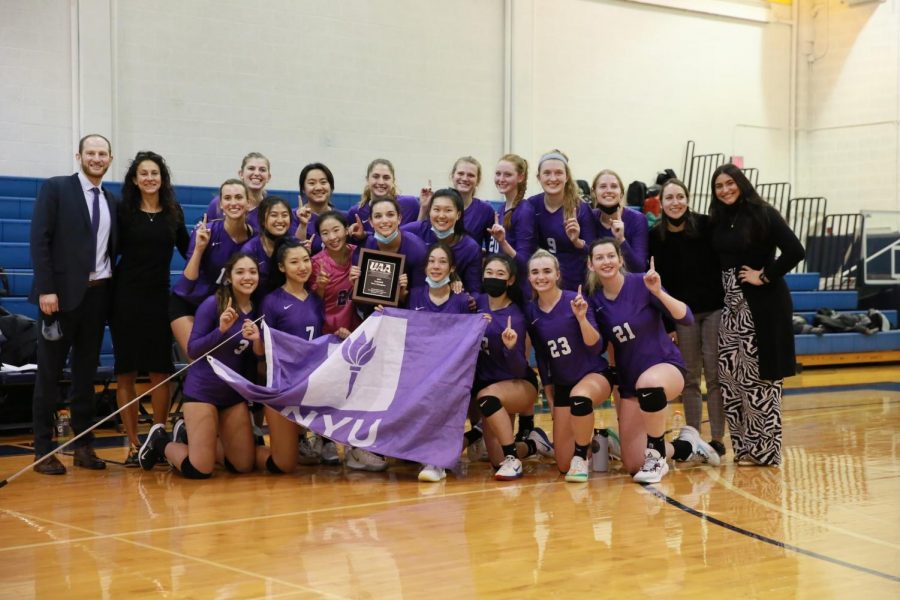 NYU Women’s Volleyball celebrates their 2021 University Athletic Association Conference Championship victory over Emory University. This win was part of a historic season for the team. (Image courtesy of Abby Ausmus)