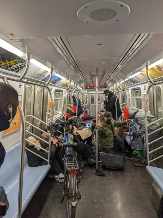 A man was shot on the A train in Brooklyn on Dec.18. Bystanders crouched on the subway floor moments after shots were fired. (Staff Photo by Arnav Binaykia)