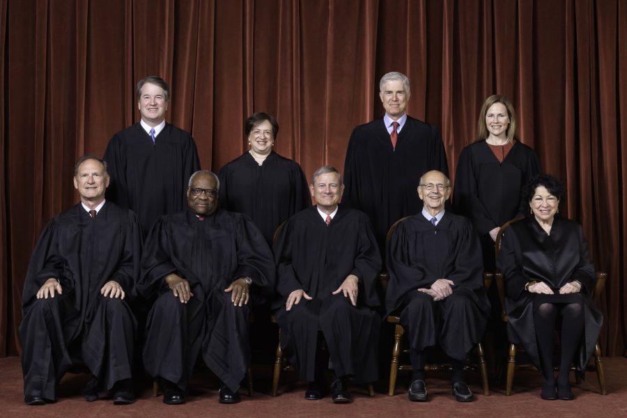 Sitting+at+center+bottom+is+the+current+Chief+Justice+John+Roberts.+The+center-right+67-year-old+has+been+the+chief+justice+of+the+United+States+since+2005.+%28Photo+by+Fred+Schilling%2C+via+Wikimedia+Commons%29