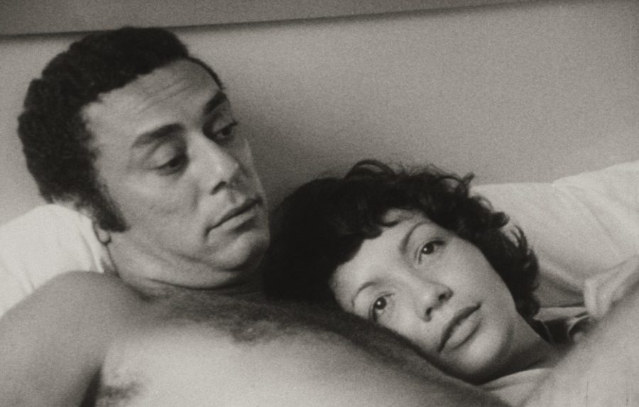 Mario Balmaseda and Yolanda Cuéllar are seen lying in bed during a scene from the Cuban film “One Way or Another.” This film was recently preserved by MoMAs “To Save and Project.” (Courtesy Arsenal – Institut für Film und Videokunst)