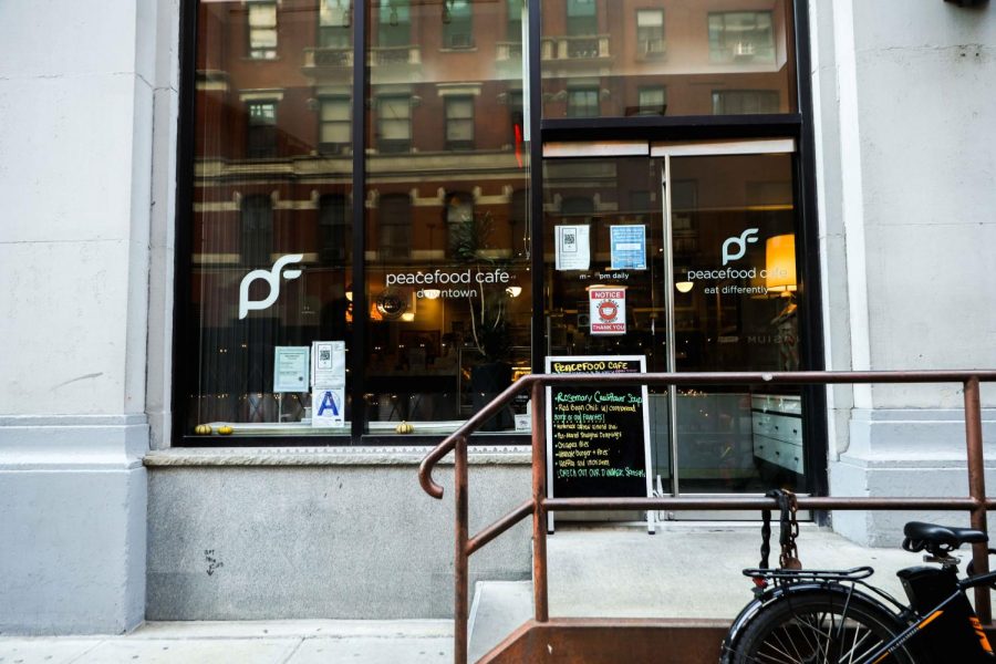 The downtown location of Peacefood Café is located at 41 E. 11th St. (Staff Photo by Sam Tu)