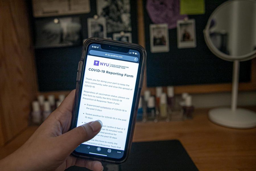 Students, faculty and staff must use NYU’s self-reporting form if they have symptoms of COVID-19, test positive for the virus or come in contact with someone who tests positive. (Staff Photo by Ryan Walker)