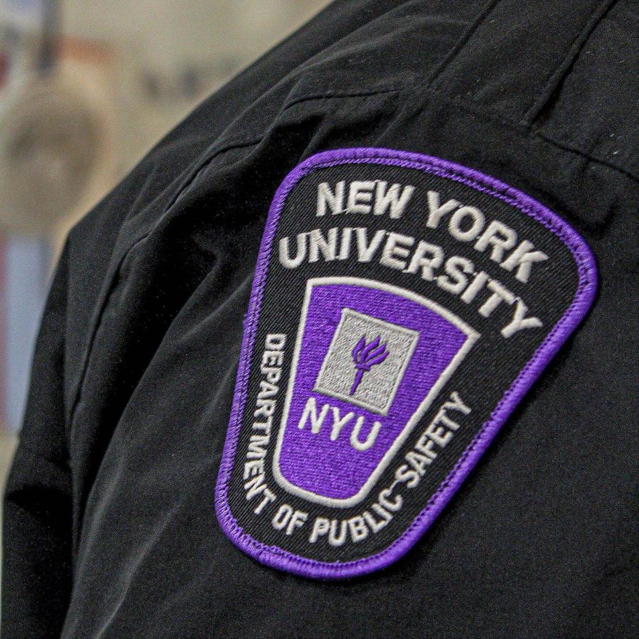A+purple+uniform+patch+with+the+logo+of+the+NYU+Department+of+Public+Safety+on+the+shoulder+of+a+Public+Safety+Officer.