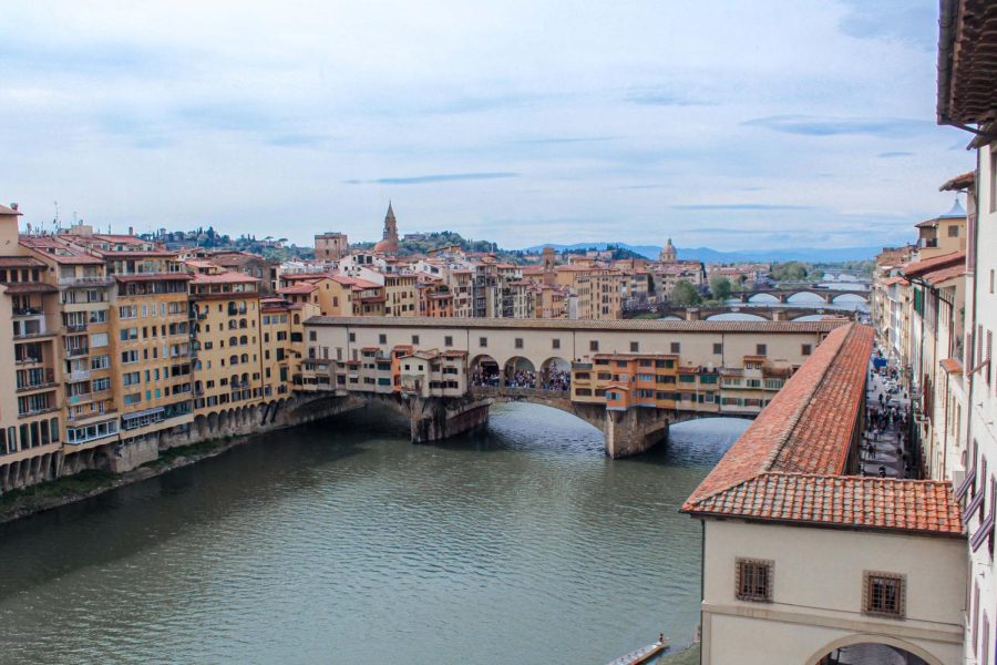 The Ponte Vecchio bridge over the Arno River in Florence, Italy.