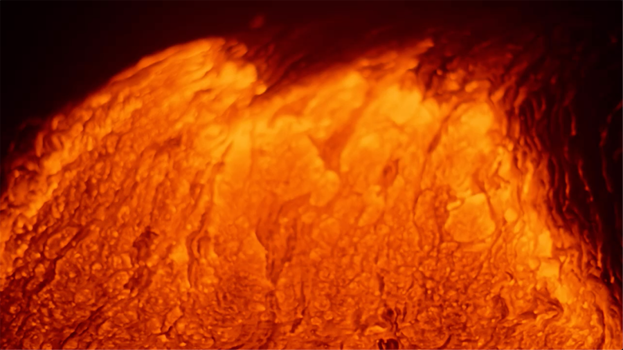 A close-up shot of bright orange lava.