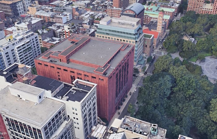 A satellite image of Bobst Library and its surroundings. The roof of the library, upon which solar panels were recently installed, is visible. The imagery predates the installation of the solar panels, and they are not shown.