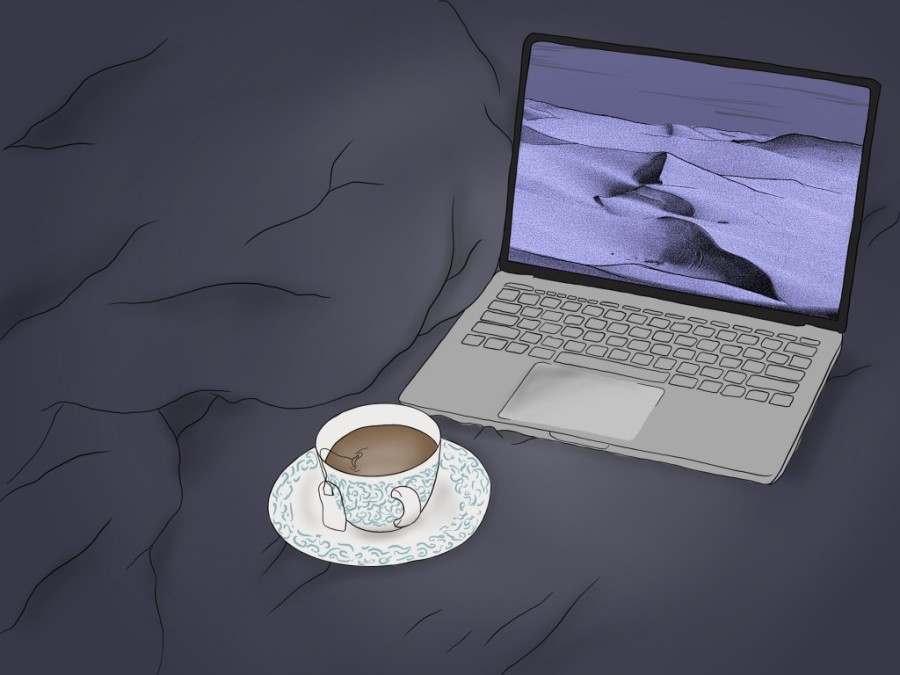 An illustration of a computer on a bed covered with a blue blanket. The computer’s screen displays light blue mountains. Next to the computer is a small teacup.