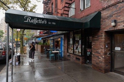 The sidewalk green tent entrance to Raffetto’s restaurant.