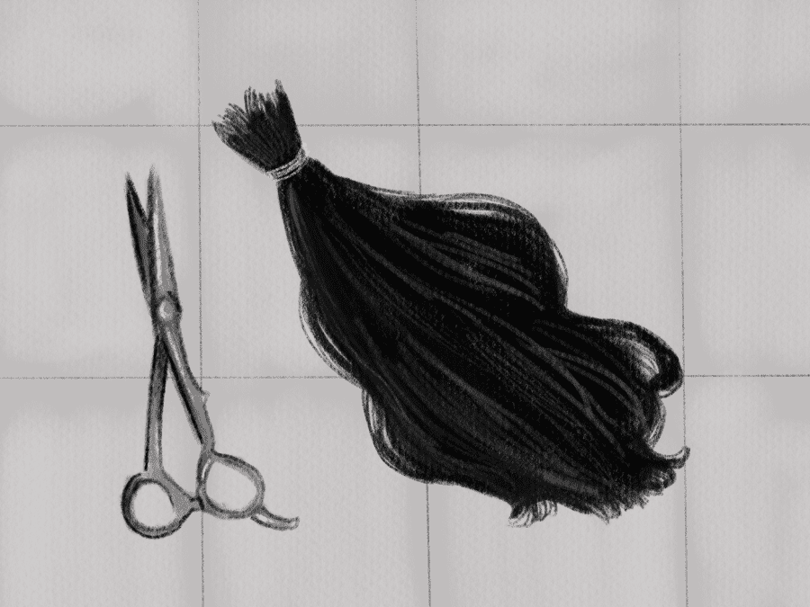 A pair of scissors and a string of black hair sit against white tiles.