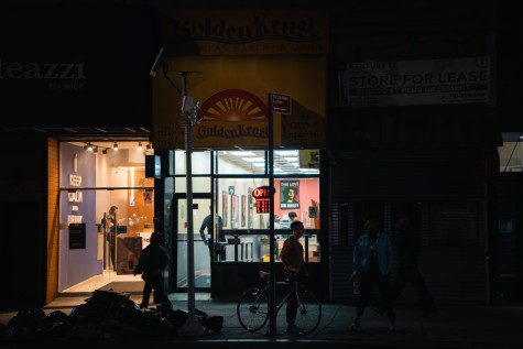An exterior shot of Golden Krust at night, located on 47 W. 14th Street.