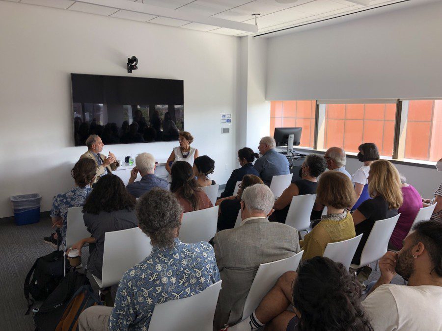 Author Suad Amiry talks with Columbia University professor Edward Said in front of a classroom full of people at the Barnard Center for Research on Women in Columbia University.