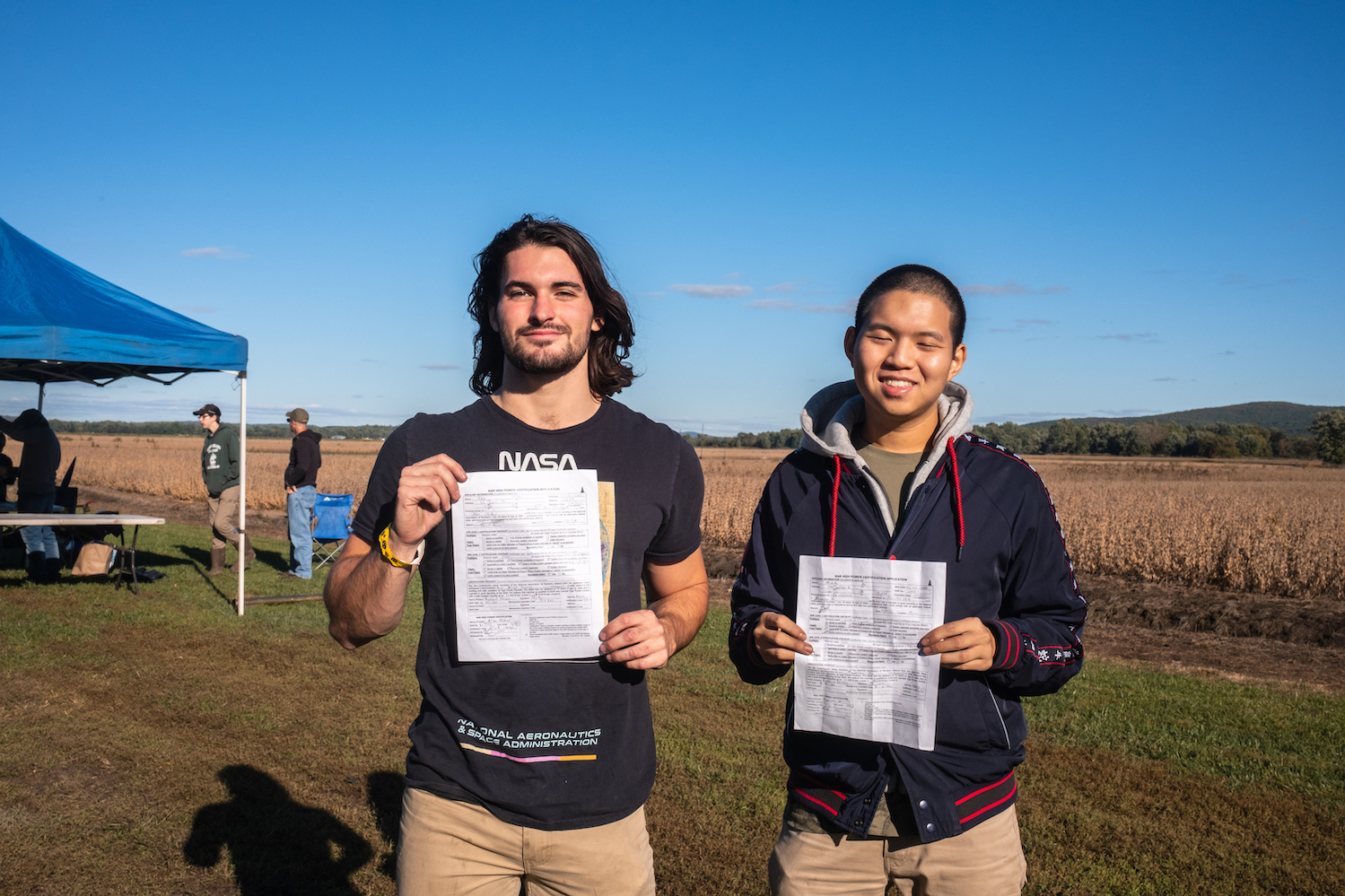 Alex Miller and Alex Xu showcase their level two certifications after their successful launch.