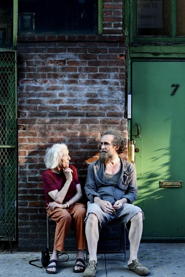 Giovanni (right) sits with his mentor on Bleecker Street. (Sheridan Smith for WSN)