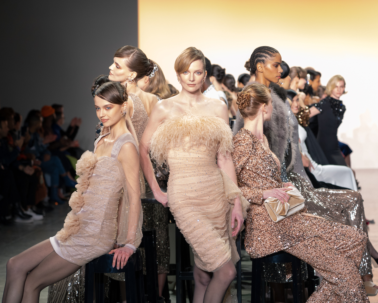The end of the Badgley Mischka show, when all the models came out on the runway to pose around a group of chairs.