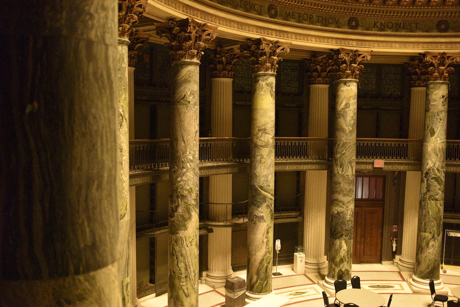 The interior of the library features columns, patterns and statues.
