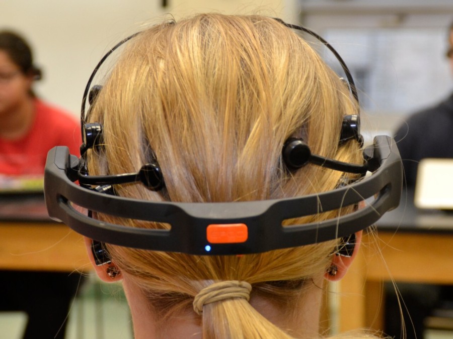 A wearable electroencephalogram device with several nodes in contact with a person’s head.