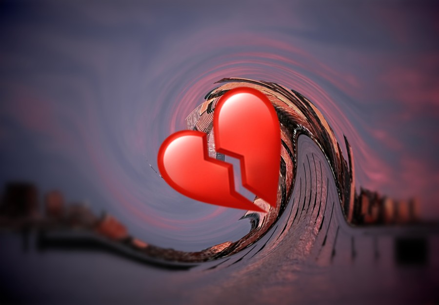 A manipulated image showing a red broken-heart emoji superimposed against a warped image of the New York City skyline.