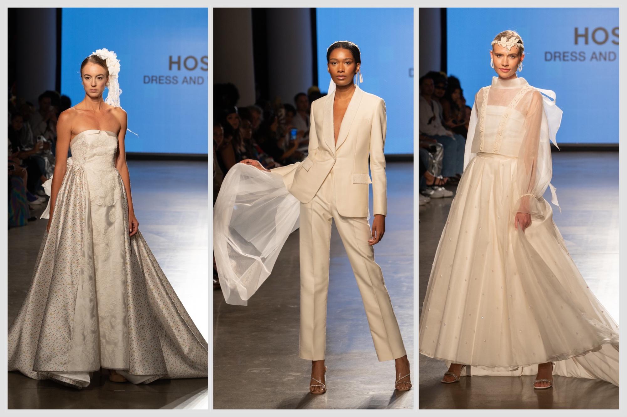 From left to right: a modeling wearing a white wedding dress; a model wearing a cream pantsuit with a veil attached to the back; a model wearing a silk white two-piece dress.