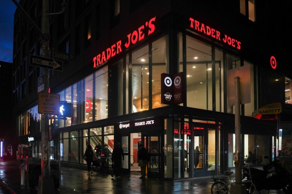 The exterior of Trader Joe’s during the nighttime, located on 400 Grand St.