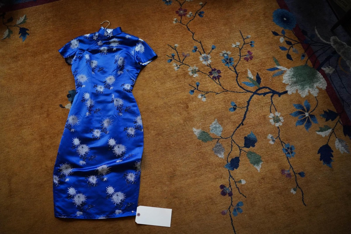 A blue cheongsam dress sold at the store.