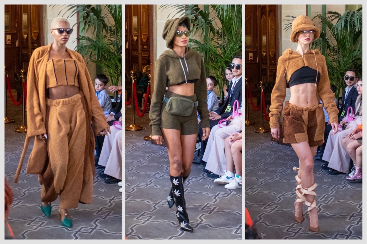 From left to right: a model wearing an army green sherpa crop top hoodie as well as a fanny pack, a pair of booty shorts and a bucket hat of the same texture and shade; a model wearing a tan sherpa coat, as well as a black-lined crop top and a pair of pajama pants of the same color and texture; a model wearing a tan sherpa cropped hoodie as well as a bucket hat and a pair of patchy shorts of the same color and texture.