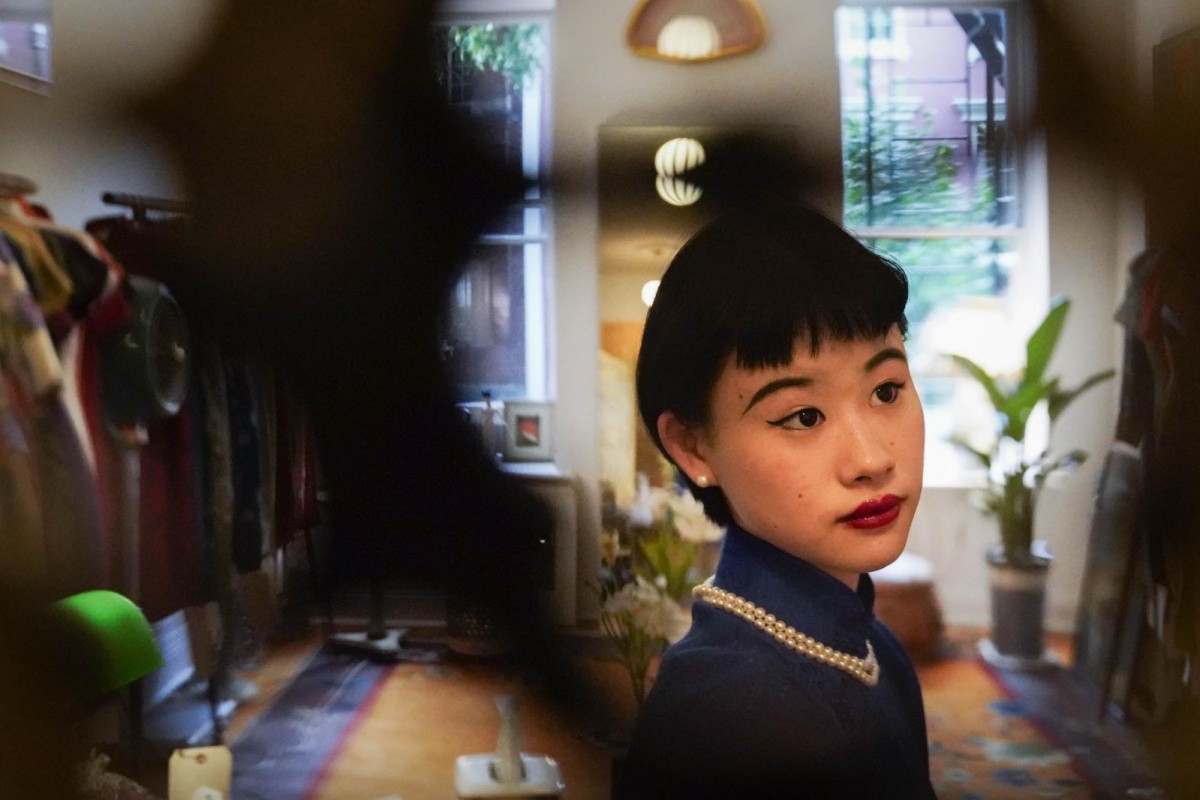Heather Guo, an NYU Junior, stands in her own Cheongsam store “Xiangjiang Silk Company.”