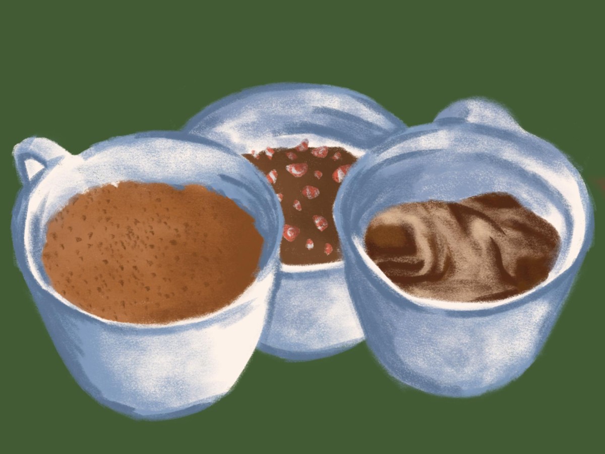 An illustration of three blue mugs with cake baked in them on a green background.