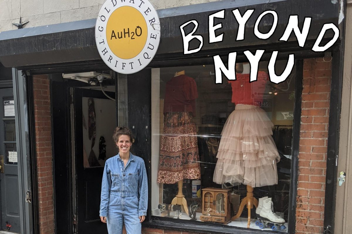 A woman wearing a denim jumpsuit stands in front of a red brick storefront. A circular sign above her reads: “Goldwater Thriftique.” On top of the image is a text graphic that reads “BEYOND N.Y.U.”