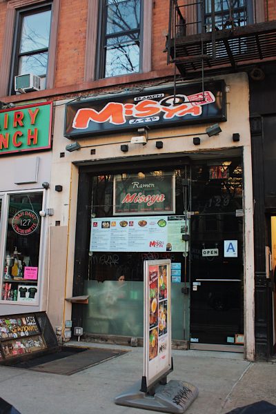 Beige storefront with a black sign that says “RAMEN MiSOYA” in orange lettering.