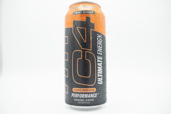 A wet black and orange can of orange cream-flavored C4.