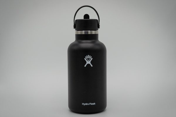 A large black water bottle against a white background.