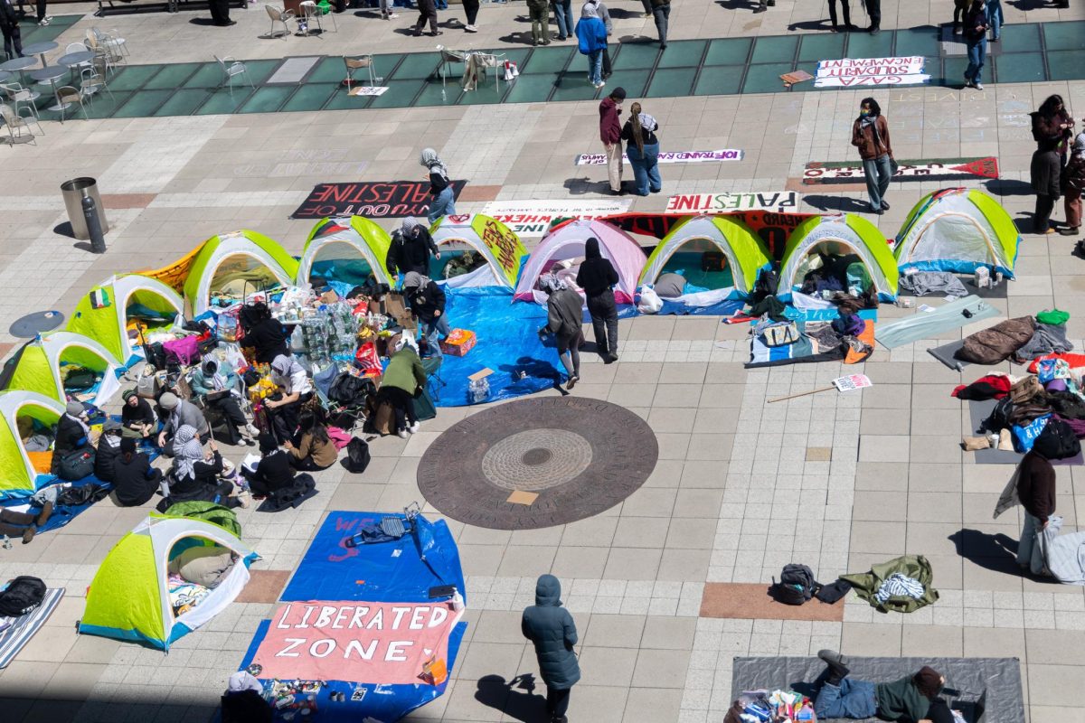 Protesters+set+up+tents+at+NYUs+first+Gaza+Solidarity+Encampment+on+Gould+Plaza.+%28Krish+Dev+for+WSN%29