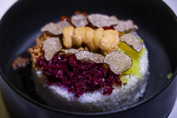  Sea urchin over rice with truffle shavings on top. 