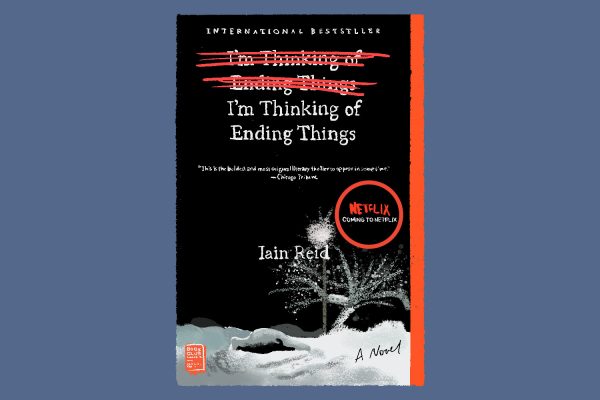 An illustration of a black book with a red stripe and a white snowy tree. It says “I’m Thinking of Ending Things” twice, with the first one crossed out in red. It also says “Iain Reid”, “INTERNATIONAL BESTSELLER”, “COMING TO NETFLIX” and “‘This is the boldest and most original literary thriller to appear in some time’ - Chicago Tribune.”