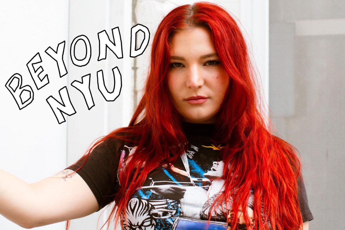 Chloe George in red hair stands against a white background.“BEYOND N.Y.U.” is written in white font in the top-left corner.