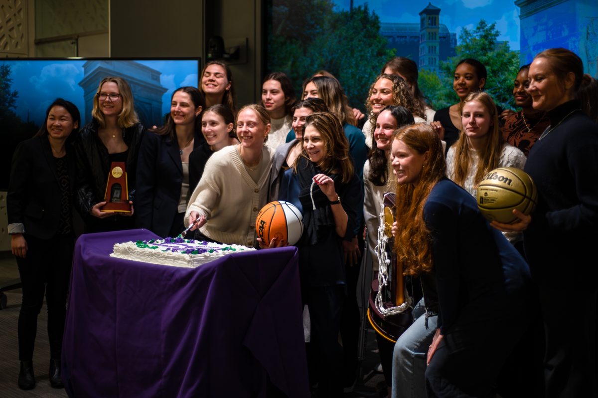 NYU womans basketball team celebrated their historic win at the University Senate meeting on March 28. (Manasa Gudavalli for WSN)