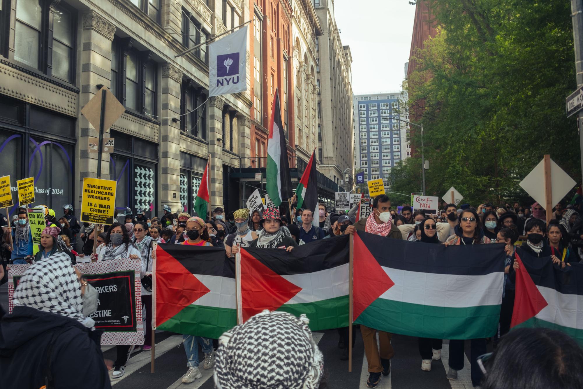 A pro-Palestinian march passing through Washingont Square East.