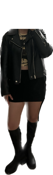 Someone wearing a beige and black, a leather jacket, a black skirt and black knee-high boots.