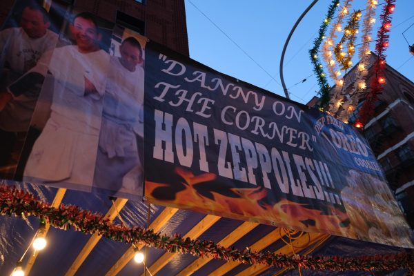 A banner with three photos of a chef that reads, “DANNY ON THE CORNER, HOT ZEPPOLES” in white text.