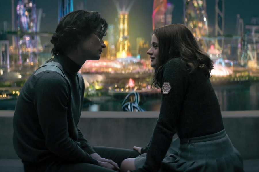 Two people sit closely looking at each other in a futuristic, brightly lit background.