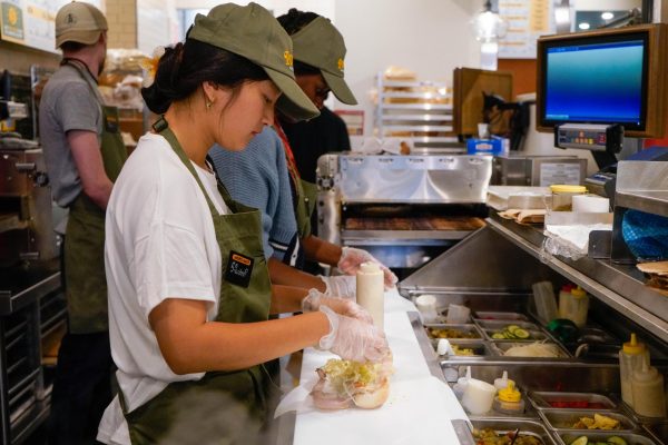 Two Potbelly employees making sandwiches.