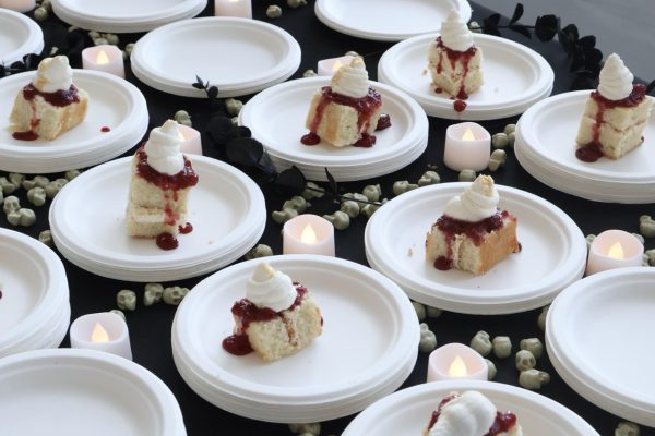 Multiple pieces of cake on a table.