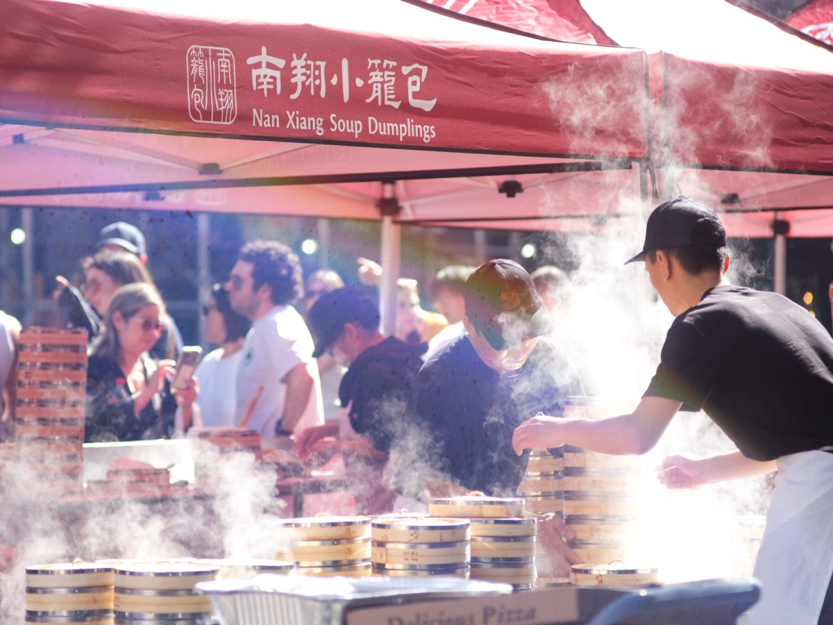 A look at the top of a red food concession tent. “Nan Xiang Soup Dumplings” is written in white text.