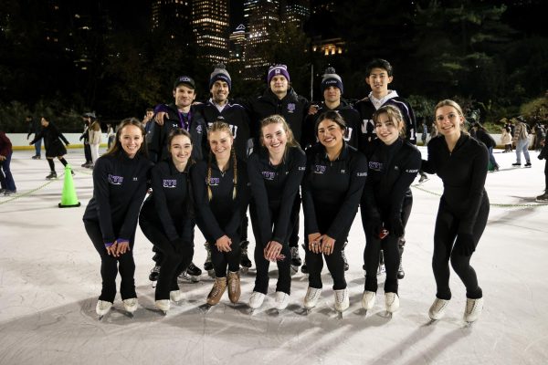 A group of N.Y.U skaters pose for a photo.