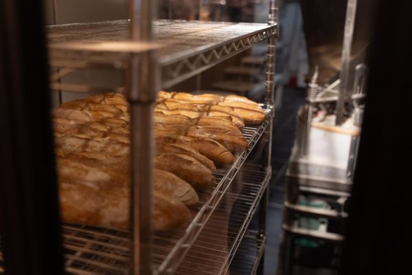 Baguettes on metal wire shelves.