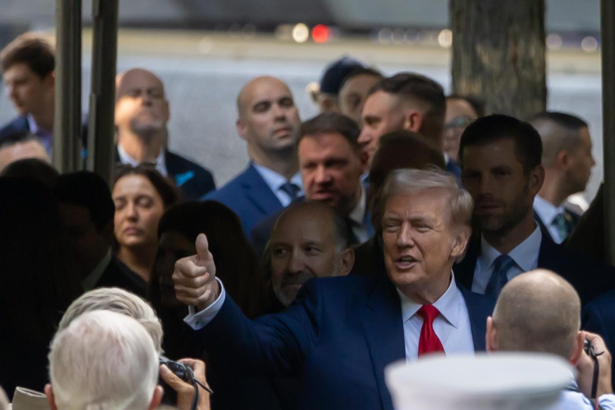 President elect Donald Trump gives a thumb up.